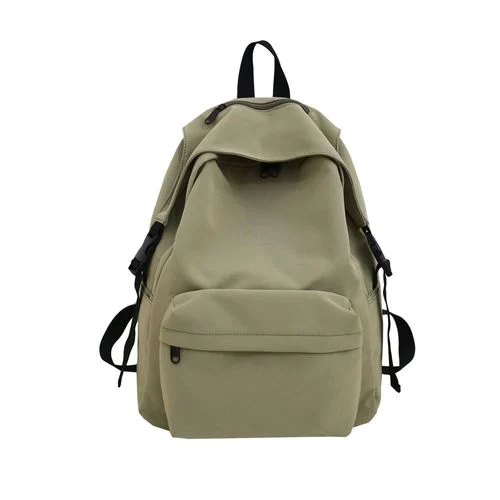 Customer photograph of an olive school backpack with a rounded top and a front pocket